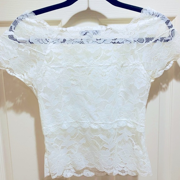 Step up your look with this short sleeve top! - Picture 3 of 3